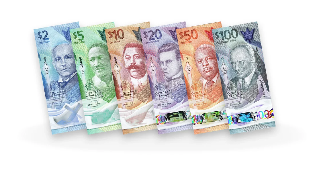 a row of different colored currency