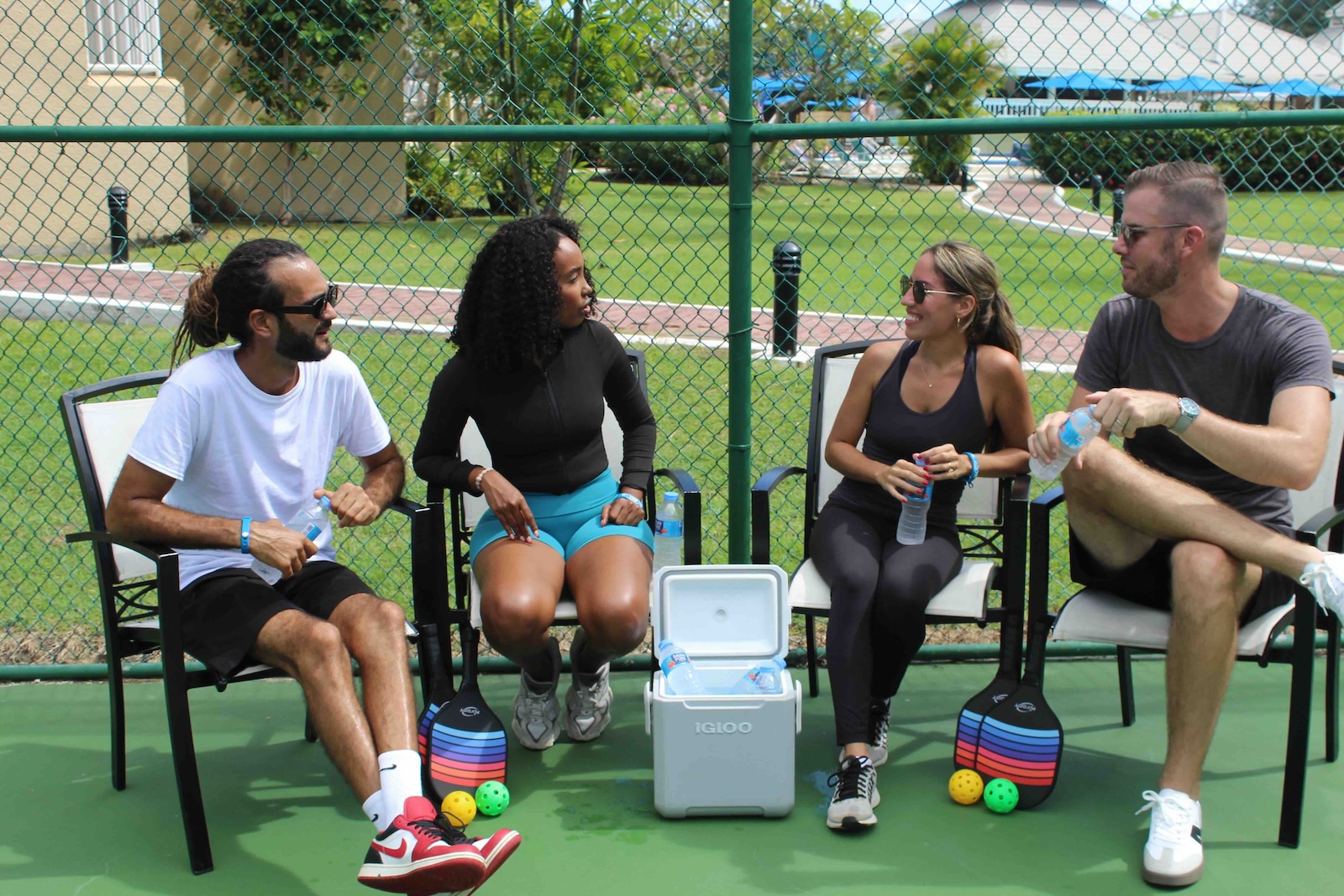 a group of people sitting on chairs